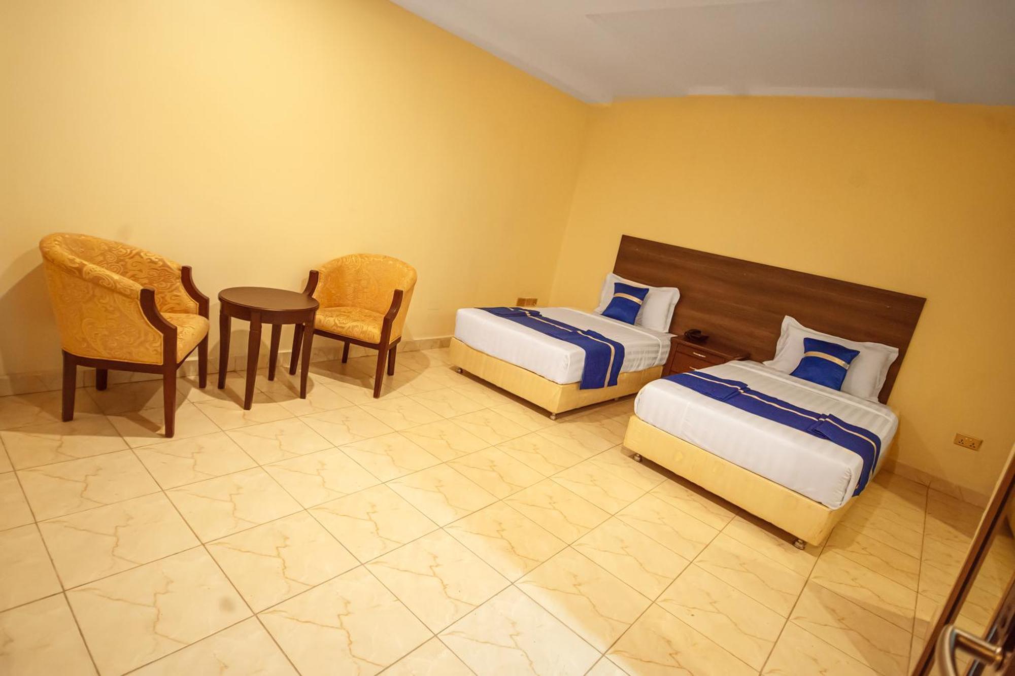 Koki Hotel Kampala Værelse billede